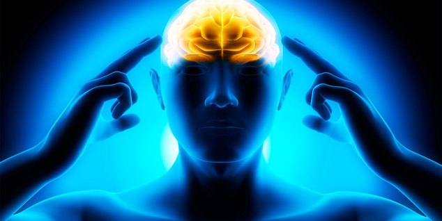 Glowing brain under a person's hands